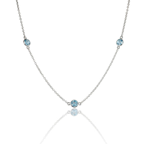Collier en or 14 carats et topaze bleue par Alexis Jae